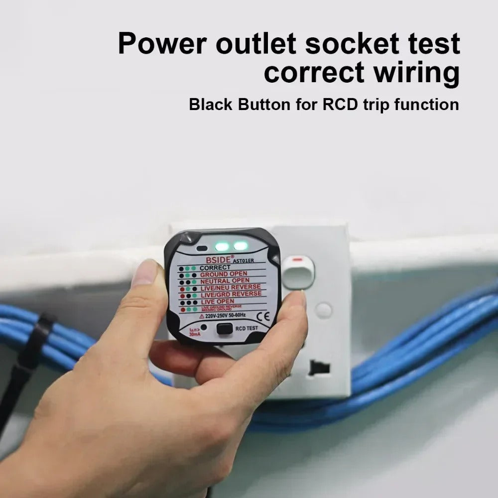 Outlet tester plugged into a wall outlet, two green lights on
